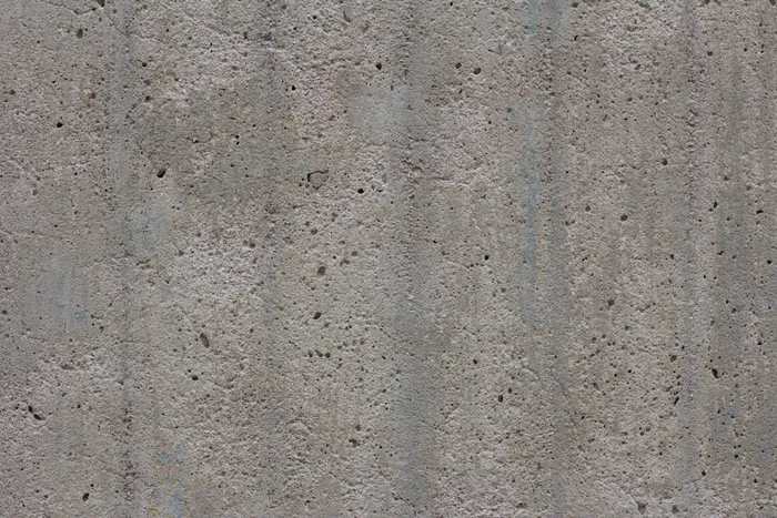 Weathered gray concrete with faint vertical staining