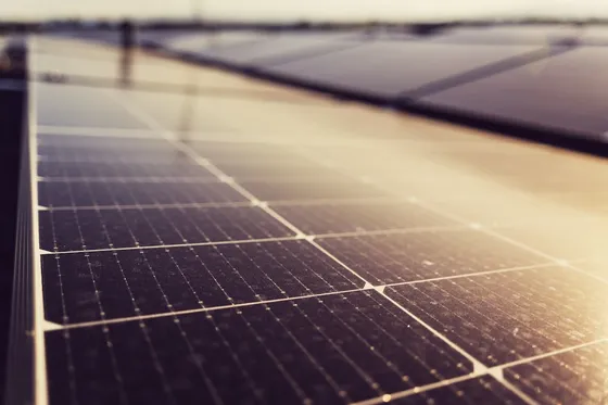Close-up of solar panels catching bright, direct sunlight